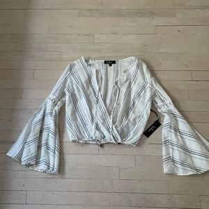 Lulus open front top with bell bottom sleeves